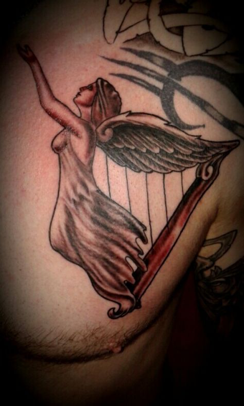 Angel of eire harp. Kinda made it up myself :-) Angel With Harp Tattoo, Music Box Tattoo, Harp Tattoo, Angel Playing Harp, Box Tattoo, Only Angel, Angel Music, Sunset Tattoos, Music Tattoos