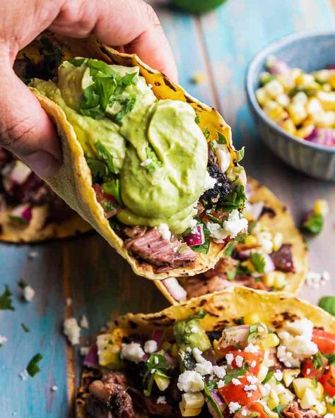 ​​Easy Leftover Brisket Tacos Cilantro Lime Crema Recipe, Brisket Tacos Recipe, Avocado Lime Crema, Lime Crema Recipe, Sour Cream Alternative, Fish Tacos With Mango Salsa, Fish Taco Recipe, Crema Recipe, Brisket Tacos