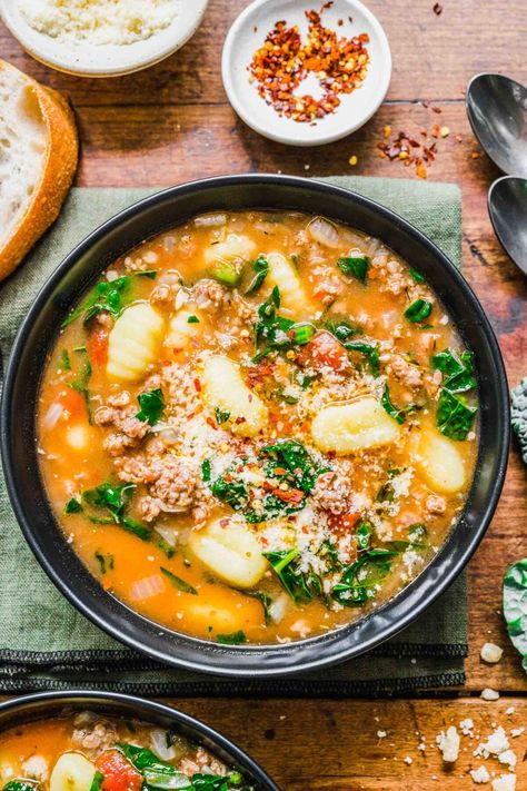 How to Make Hearty Sausage Gnocchi Soup Sausage Gnocchi Soup, Spicy Sausage Soup, Tomato Gnocchi Soup, Longhorn Parmesan Crusted Chicken, Sausage Slow Cooker, Sausage Gnocchi, Gnocchi Recipes Soup, Sausage And Kale, Spicy Italian Sausage