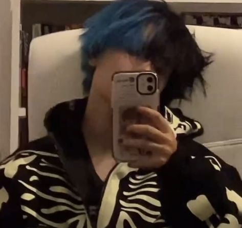 emo boy blue and black split dye hair mirror selfie skeleton jacket Hair Dye Men Aesthetic, Fancy Hair Color Ideas, Half Black And Blue Hair, Blue Hairstyles Short, Black Blue Hair Men, Hairstyles For Split Dyed Hair, Blue And Black Split Dye Short Hair, Blue And Black Hair Aesthetic, Mens Split Dye