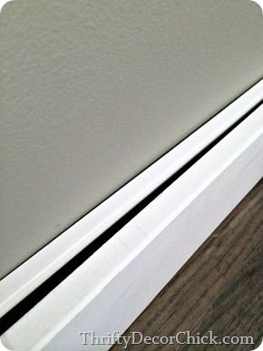 How to Install New Baseboards Without Removing the Old New Baseboards, Tall Baseboards, Baseboard Trim, Budget Remodel, Thrifty Decor Chick, Decorating A Bedroom, Narrow Hallway Decorating, Crown Moldings, House Trim