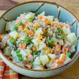 a bowl of Vietnamese potato salad Potato Salad With Carrots, Carrots Pickled, Steak Bites And Potatoes, Salad With Carrots, Asian Steak, Beef Cubes, Asian Steak Bites, Dill Potatoes, Pickled Cucumbers