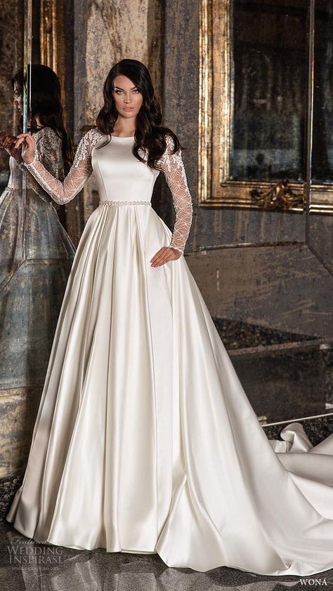 Weddinginspirasi.com featuring - wona 2020 edem bridal sheer long sleeves bateau neckline clean bodice a line ball gown wedding dress chapel train (13) mv -- WONÁ 2020 Edem Bridal Collection Wedding Dresses #wedding #weddings #bridal #weddingdress #weddingdresses #bride #fashion #collection:Edem #label:WONÁ #week:142020 #year:2020 ~ Floor Length Wedding Dress With Sleeves, Wedding Dress Full Coverage, Satin Gowns With Sleeves, Modest Ball Gown Wedding Dress, Satin Wedding Gown With Sleeves, Bateau Neckline Wedding Dress, Satin Wedding Dress Long Sleeve, Bridal Gowns With Sleeves, Long Sleeve Satin Wedding Dress