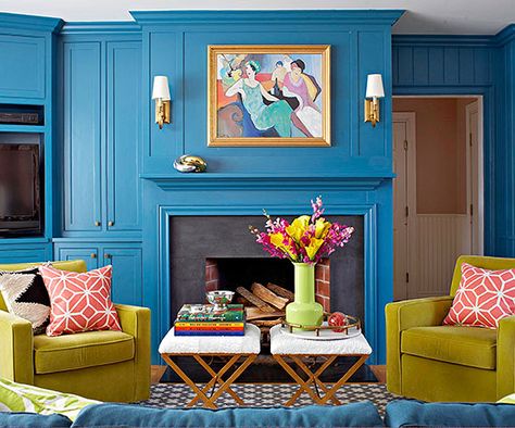 Dial up the drama with a wild shade of blue on your walls. Unique Paint Colors, Simple Fireplace, Family Room Colors, Dark Blue Walls, Teal Walls, Blue Paint Colors, Bedroom Color Schemes, Blue Living Room, Green Chair