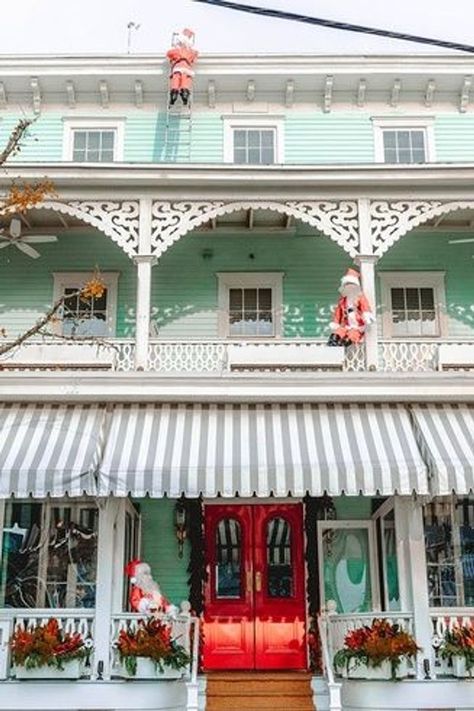 A great way to get into the holiday spirit in New Jersey is to experience Christmas in Cape May. Discover the best Cape May Christmas events and activities for one of the best places to spend Christmas in New Jersey. | cape may Christmas lights | cape may new jersey Christmas | Christmas in cape may NJ | cape may at Christmas Cape May New Jersey Christmas, Cape May Christmas, Cape May New Jersey, Winter Travel Destinations, Usa Destinations, Cape May Nj, Christmas Events, Cape May, Winter Travel