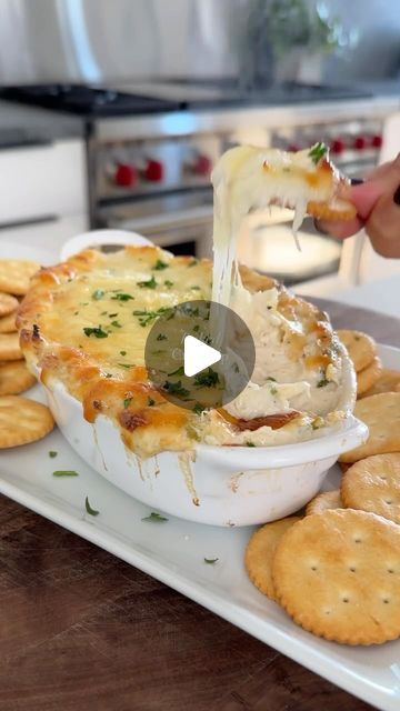 FEAST ON THESE on Instagram: "Baked Crab Dip 🦀 Bookmark This Recipe By @maxiskitchen #feastonthese #crab #seafood #recipeshare   Ingredients:  For the Dip:▪️1/4 Cup Best Foods Mayonnaise▪️1 Clove Garlic, grated or minced▪️1 Scallion, sliced▪️4 oz. Reduced Fat Cream Cheese, softened▪️1/4 Cup Light Sour Cream▪️1/2 Cup White Cheddar Cheese, shredded▪️8 oz. Lump Crab Meat▪️1/2 a Lemon, juice▪️1/2 tsp Old Bay Seasoning▪️1/2 tsp Worcestershire Sauce▪️1/4 tsp Black Pepper▪️  On Top:▪️1/3 Cup White Cheddar Cheese, shredded▪️2 Tbsp Parmesan Cheese, grated▪️  Options For Serving:▪️Crackers▪️Tortilla Chips▪️Crostini▪️  1️⃣ Preheat oven to 350°F 2️⃣ Add the mayonnaise, garlic, scallion, cream cheese, sour cream, white cheddar, crab, lemon, old bay, worcestershire, and pepper to a bowl; mix to combine Scallion Cream Cheese, Baked Crab Dip, Dip Recipes Hot, Baked Crab, Lump Crab Meat, Lump Crab, Crab Dip, Healthy Dips, White Cheddar Cheese