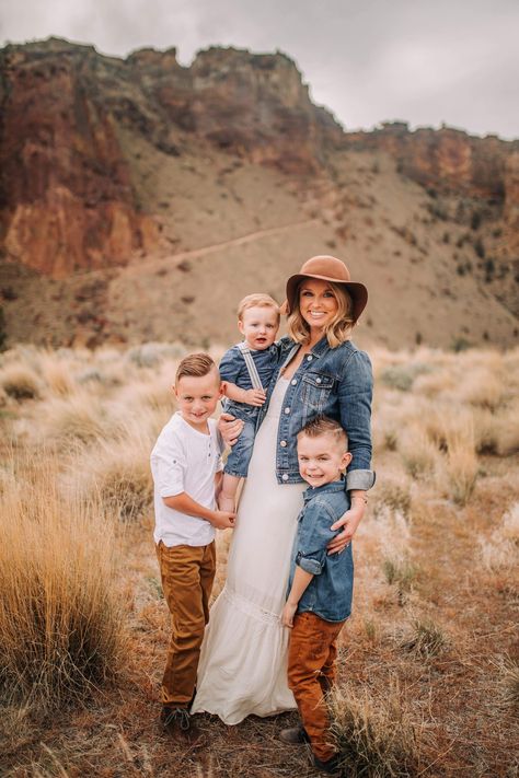 Mom & me session at Smith Rock State Park in Terrebonne, OR. Stylish hat, jean, blue brown white tones family outfit guide, Oregon photography, family session, #familyphotography Family Photoshoot Outfits Earthy Tones, Causal Family Pictures Outfits, Jean Jacket Photoshoot Ideas Family, Off White Family Picture Outfits, Blue Sage Clay Neutrals Family Photos, Family Photo Jean Outfits, Denim Outfit Family Photoshoot, Brown And Blue Family Pictures, Jean Jacket Family Photos