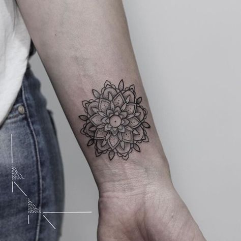 12 Stunning Mandala Tattoos With Deep Meanings Wrist Mandala, Mandala Tattoo Meaning, Mandala Wrist Tattoo, Mandela Tattoo, Illustrative Tattoo, Berlin Tattoo, Mandala Hand Tattoos, Skeleton Hand Tattoo, Design Mandala