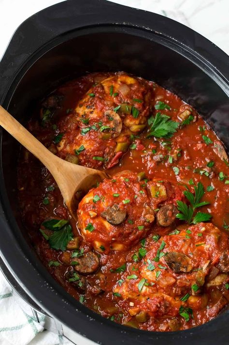 Easy Slow Cooker Chicken Cacciatore. A tasty slow cooker dinner made with boneless, skinless chicken breasts, crushed tomatoes, mushrooms, and bell peppers. Chicken Cacciatore Easy, Boneless Skinless Chicken Breast Recipes, Skinless Chicken Breast Recipes, Slow Cooker Chicken Healthy, Chicken Breast Slow Cooker, Chicken Crockpot Recipes Healthy, Chicken Breast Crockpot Recipes, Cacciatore Recipes, Slow Cooker Chicken Thighs