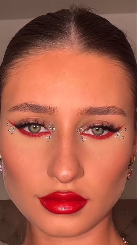 Red Bedazzled Makeup, Rebelde Concert Makeup, Red Eyeliner With Gems, Red Eye Makeup Gems, Red Album Makeup, Red Cheer Makeup, Ferrari Makeup Look, Rbd Inspired Makeup, Rbd Concert Makeup Ideas