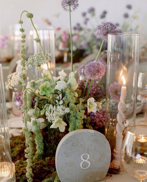 Stone Table Numbers, Lavender Wedding Centerpieces, Natural Stone Table, Contemporary Wedding Decor, Green Tablescape, Wildflower Wedding Theme, Lavender Wedding Flowers, Light Purple Flowers, 2025 Wedding