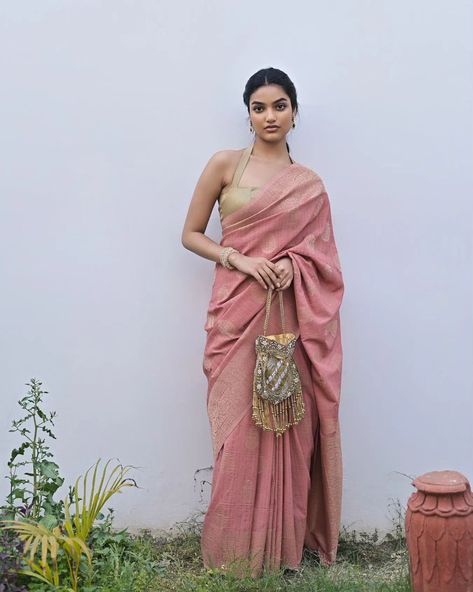 Experience the soft elegance of the Anahita blush pink viscose saree with an intricate overall butta design. 💕 Trendy and timeless, this saree adds a touch of modern grace! ✨ . . . ( Blush pink saree | Viscose Saree | Blush pink |Sarees | Indian wear | Surat) Dusty Pink Saree, Blush Pink Saree, Light Pink Saree, Pink Sarees, Butta Design, Golden Saree, Boutique Dress Designs, Boutique Dress, Saree Look