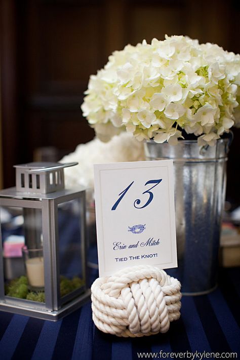 Non-Floral Centerpieces For Your South Florida Wedding | Partyspace.com Articles Beach Wedding Table Numbers, Rope Table, Non Floral Centerpieces, Wedding Table Number Holders, Beach Wedding Tables, Wedding Knot, Blue Beach Wedding, Table Markers, Nautical Table