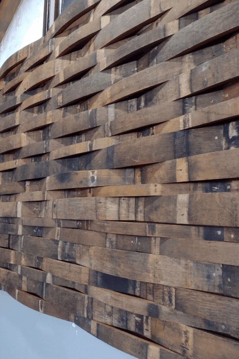 How we used broken wine barrel staves to make a woven wall. Wine Barrel Wall, Deck Projects, Finished Basement, Whiskey Barrel, Wine Barrel, Half Bath, Diy Stuff, Store Front, Finishing Basement