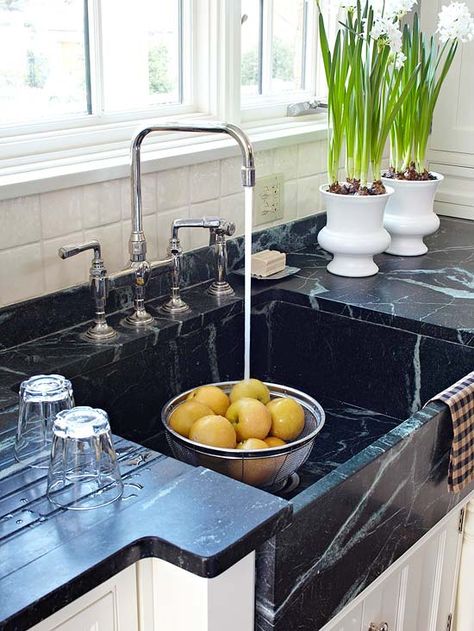 Love this deep apron-front soapstone sink and the ridges carved into the countertop next to it to serve as a built-in drying rack.  Especially love the faucet set. Farm Kitchen Ideas, Black Marble Countertops, Soapstone Countertops, Kitchen Sink Design, Farm Kitchen, Sink Design, Farmhouse Sink Kitchen, Transitional Kitchen, Kitchen Marble