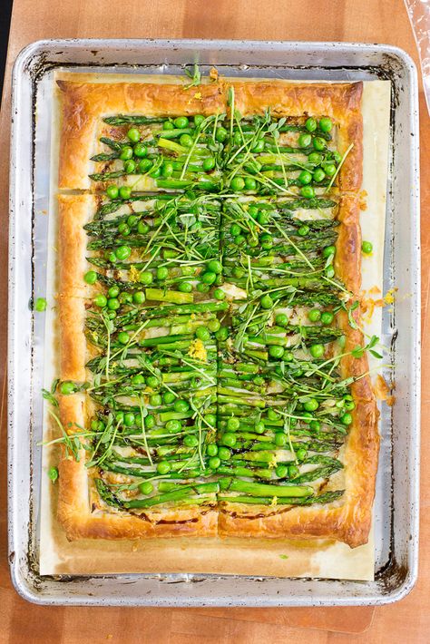 Asparagus and Pea Gruyere Tart. Perfect for Mother's day! Alice Choi whips up a simple asparagus gruyere tart that is perfect for spring. -- April 25, 2016 Ricotta Asparagus, Phyllo Tart, Gruyere Tart, Spring Appetizer, Herbed Ricotta, Easy Asparagus, Phyllo Dough Recipes, Phyllo Recipes, Spring Appetizers