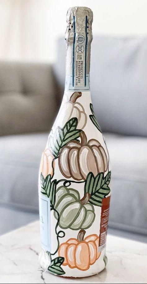 Pumpkin Painted Wine Bottles, Halloween Painted Champagne Bottles, Fall Painted Champagne Bottle, Fall Painted Bottles, Fall Wine Bottle Painting Ideas, Hand Painted Wine Bottles Ideas, Fall Painted Wine Bottles, Champagne Bottle Painting, Pretty Wine Bottles