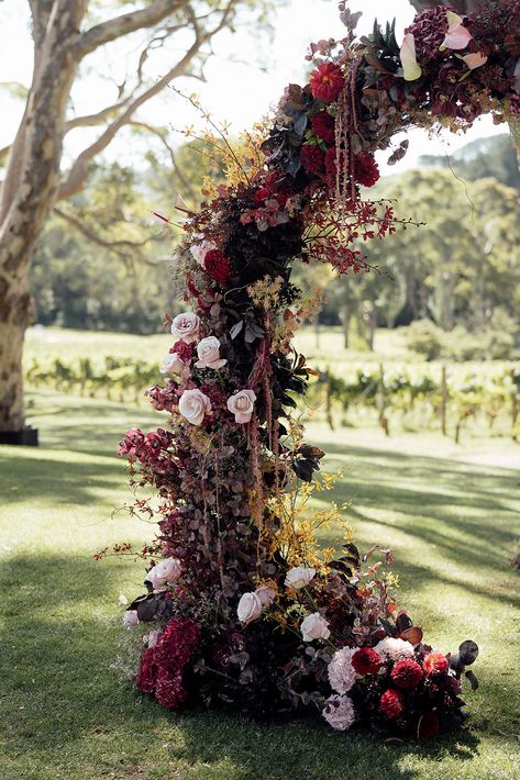 Blush pinks, plums, burgundy, dark reds and raspberry tones with pops of yellow make for this interesting flower combination. Beth and Kin | Poppy Culture | Melbourne Florist | Polperro | Mornington Peninsula Fall Wedding Ceremony Flowers, Moody Wedding Flowers, Wisteria Wedding, Burgundy Wedding Flowers, Copper Blush, Fall Ceremony, Burgundy And Blush Wedding, Fall Wedding Ceremony, Wedding Archway