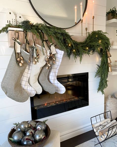 Christmas Tv Stand Garland, Christmas Mantle Manger Scene, Christmas Garland Over Fireplace, Mantle With Garland And Stocking, Christmas Mantel With Lanterns, Farmhouse Mantle Garland, Christmas Mantel Minimalist, Stockings By Fireplace, Christmas Mantle Decor With Bells