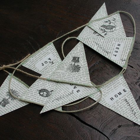 Stamped newspaper bunting Paper Bunting Ideas, Christmas Stall Ideas, Music Sheet Paper, Bunting Tutorial, Vintage Bunting, Wellness Workshop, Old Book Crafts, Book Craft, Paper Bunting