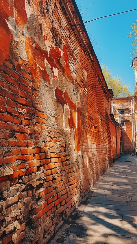 Weathered Brick Alley: A narrow alleyway flanked by an old weathered brick wall bathed in natural sunlight. #alley #brick #wall #weathered #sunlight #aiart #aiphoto #stockcake ⬇️ Download and 📝 Prompt 👉 https://ayr.app/l/L7UK Brick Wall Photography, Square Prism, Brick Wall Texture, Old Brick Wall, City Flowers, Brick Texture, Urban Graffiti, Brick Road, Old Bricks