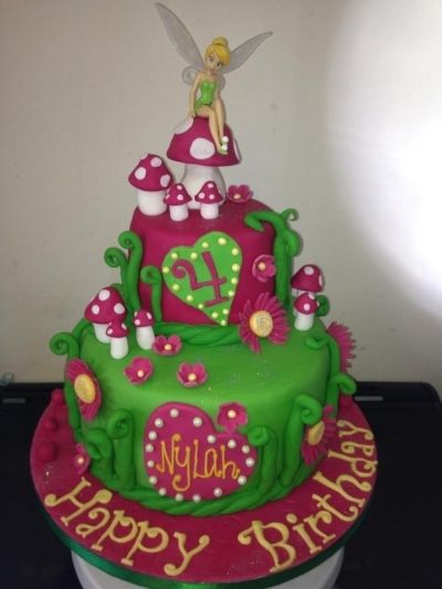 tinkerbell cake By CAKE_by_laura on CakeCentral.com Pirate Fairy Cake, Tinkerbell Birthday Cakes, Fairy Birthday Cake, Tinkerbell Cake, Barbie Birthday Cake, 5th Birthday Cake, Barbie Doll Cakes, Frozen Birthday Cake, Purple Cakes