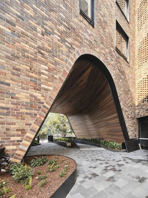 DKO, Breathe complete Australia's largest recycled brick building | ArchitectureAU Recycled Brick, Building Entrance, Industrial Architecture, Roof Architecture, Architecture Ideas, Brick Architecture, Entrance Design, Dance School, Brick Facade