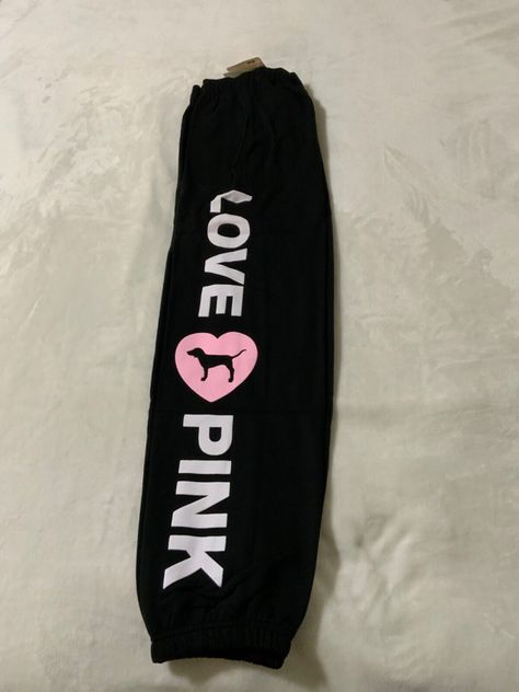 NEW WITH TAGS MEDIUM BLACK  FLEECE BAGGY CAMPUS PANT Everyday comfy fleece Relaxed oversized fit Elasticated waistband with adjustable drawcord Elasticated leg opening Side entry pockets 28" inseam Imported cotton/polyester NO RETURNS ACCEPTED U S BIDDERS ONLY Pink Y2k Aesthetic, Fits Baddie, Pink Store, Vs Pink Nation, Victoria Secret Sweatpants, Clothing Board, Pink Outfits Victoria Secret, Victoria Secret Pink Sweatshirts, 2000s Clothes