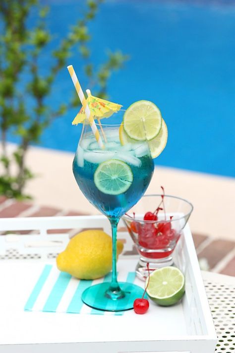 Tropical Blue Summer Sangria Recipe! Blue Sangria, Tropical Sangria, Summer Sangria Recipes, Easy Sangria Recipes, Yummy Summer Drinks, Perfect Summer Drink, Summer Drink Recipes, Sangria Recipes, Blue Curacao