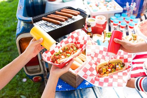 Fourth of July Ideas for Your Backyard BBQ | Brit + Co Fourth Of July Ideas, Fourth Of July Party Ideas, July 4th Decorations, Diy Banners, 4th Decorations, Giant Donut, Rainbow Donut, Hot Dog Toppings, Hot Dog Bar