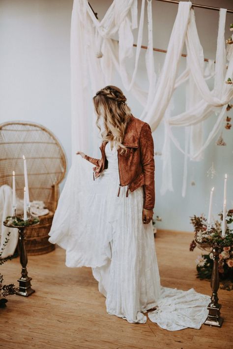 A camel-toned leather jacket is the perfect finishing touch for this rustic bridal look | Image by Local Embers & Co.  #bridaljewelry #bridalnecklace #bohowedding #bohemianwedding #weddinginspiration #weddinginspo #weddingphotography #bride #bridalfashion #bridalstyle #bridalinspiration Wedding Dress Jacket, Southwestern Wedding, Elegant Bridal Dress, Autumn Bride, Bridal Jacket, Wedding Jacket, Boho Bridal, Popular Wedding, Boho Bride