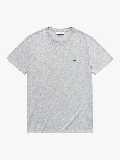 Invest in a casual and contemporary foundation piece for your wardrobe with this Lacoste Pima T-Shirt. Made from pure cotton, this is a comfortable t-shirt suitable for all year round wear. It is designed with a crew neck, short sleeves and is completed with the recognisable branded Lacoste logo on the left chest. Wear with anything from jeans to chinos and shorts. Camisa Lacoste, Best Streetwear Brands, Lacoste T Shirt, Grey Tee, Camisa Polo, Pima Cotton, Casual T Shirts, Shirt Shop, White Undershirt