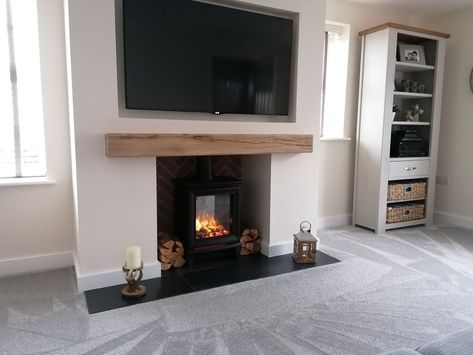 Tv Woodstove Wall, Electric Log Burner Living Room, Stove Fireplace Ideas With Tv Above, Electric Log Burner Fireplace, Electric Wood Burner, Electric Stove Media Wall, Pellet Stove With Tv Above, Log Burner Tv Wall, Gas Fireplace Ideas With Tv Above