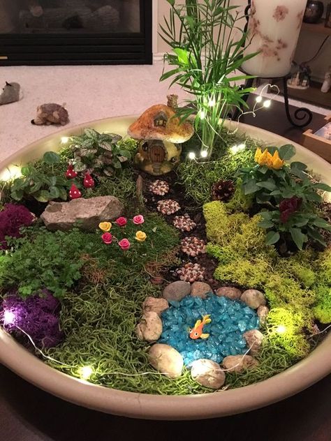 62 DIY Miniature Fairy Garden Ideas to Bring Magic Into Your Home Fairy Garden Design Ideas, Taman Diy, Fairy Garden Pots, Indoor Fairy Gardens, Fairy Garden Ideas, نباتات منزلية, Fairy Garden Designs, Fairy Garden Crafts, Faeries Gardens