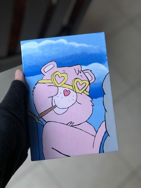 5 x 8 acrylic painting of a care bear smoking a blunt . selling on depop in link ! Carebear Paintings, Care Bear Painting Canvas, Care Bear Canvas Painting, Carebear Painting Canvas, High Painting Ideas, Care Bears Painting, Cool Cartoon Paintings, Care Bear Painting, Cute Paintings Aesthetic