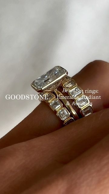 GOODSTONE on Instagram: "Greetings, jewelry aficionados and soon-to-be-engaged couples. 👋 Today, we’re diving into the world of bezel set rings. What is a bezel setting? It involves a metal rim that encircles the gemstone. Unlike prong settings with “claws,” a bezel provides a sleek and modern look. 🌟 Why choose a bezel setting? 🤔 1️⃣ Security: Ideal for active lifestyles or hands-on jobs. 2️⃣ Protection: Offers the gemstone excellent protection. 3️⃣ Sleek Design: A minimalist, modern appeal that’s timeless. 4️⃣ Low Maintenance: Less likely to snag or require frequent cleaning. But what about the downsides? 🤨 1️⃣ Limited Visibility: Covers more of the stone’s surface. 2️⃣ Weight and Cost: Can be heavier and sometimes pricier. Let’s clear up a common misconception. ✨ A bezel setting doe Bezel Emerald Cut Engagement Ring, Bezel Set Rings, Bezel Set Wedding Ring, Rings Sets, Forever Rings, Bezel Set Engagement Ring, Set Rings, Radiant Cut Engagement Rings, Bezel Engagement Ring