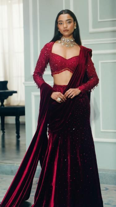 The subtle grandeur of merlot tones with our signature #MMblouse displaying extravagant glamour with fine artisanship. The blouse features intricately handcrafted bugle bead sequins and crystals with delicate tassel detailing for the perfect finish. Manish Malhotra Saree, Summer Couture, Couture 2023, Latest Bridal Lehenga, Saree Wearing Styles, Indian Outfits Lehenga, Lehenga Designs Simple, Indian Bride Outfits, Fashionable Saree Blouse Designs