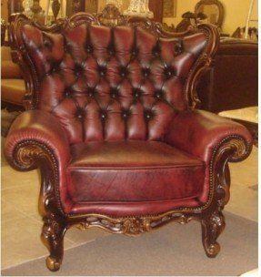 Victorian Leather Chair..for the Library. Victorian style, should definitely take a glimpse at this sculpted and button-tufted chair. Upholstered in quality leather and resting on a lovely-crafted frame, this chair has a cozy seat cushion, rolled armrests, and a wide back to grant you the comfort you are looking for. Victorian Chairs, Captain Nemo, Modern Living Room Set, Steampunk Furniture, Leather Wingback, Victorian Chair, Victorian Interiors, Leather Chairs, Victorian Furniture