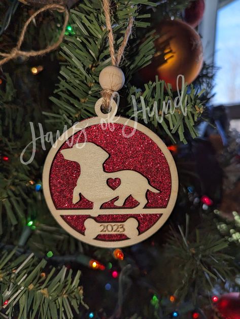 Handmade dachshund ornaments for any doxie lover. Current year will be on bone portion of ornament unless stated otherwise. Dachshund Ornament, Paw Ornament, Dinosaur Ornament, Pet Paws, Snowflake Ornaments, First Christmas Ornament, Wooden Ornaments, Holiday Christmas, First Christmas