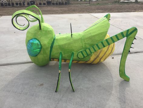 Our finished grasshopper..   #grasshopper #pinata #art 3d Grasshopper Craft, Giant Bugs Diy, 3d Insects Craft, Cardboard Insects, Cardboard Bugs, Bug Pinata, Paper Mache Insects, Vbs Magnified, Bug Party