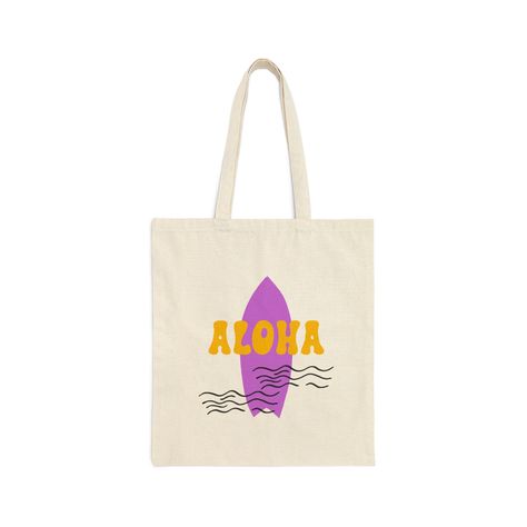 "🌺 Aloha! Embrace the Spirit of Hawaii with our Surfboard Inspired Cotton Canvas Bag 🌺 Bring a touch of the tropical paradise to your everyday adventures with our \"Aloha\" Hawaiian with surfboard Inspired Cotton Canvas Bag. This chic and versatile tote is not just a bag; it's a statement piece that reflects the laid-back vibes of Hawaii's surf culture. Crafted from high-quality cotton canvas, this bag is not only stylish but also sturdy, making it perfect for your beach trips, shopping sprees, or casual outings. 🏄 Key Features: 🌊 Surfboard Inspired Design: Adorned with a vibrant surfboard graphic and the word \"Aloha,\" this bag captures the essence of Hawaii's beach lifestyle. The bold colors and intricate details make it a standout accessory wherever you go. 🌴 Durable and Eco-Frien Billabong Canvas Bag, Surfboard Graphic, Billabong Tote Bag, Coconut Girl Tote Bag, Tropical Summer Tote Shoulder Bag, Surfboard Bag, Hawaii Surf, Surf Culture, Beach Trips