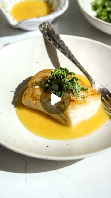 Nadia Aidi on Instagram: "Halibut & Beurre Blanc…one of my favorite combos of all time! What other recipes do you want to see?

Ingredients:
* 2 halibut filets (6-8 oz).
* 1 small shallot (brunoise).
* 1/3 cup dry white wine.
* 2.5 tbsp white wine vinegar.
* 1/2 tsp honey.
* 8 tbsp cold butter.
* Black pepper to taste.
* Salt to taste.
* Micro arugula.

Directions:
1. Preheat a pan on high for 2 min. Add in some olive oil and after 30 sec add in your salted fish. Sear on medium high for 4-5 min, flip over. Sear for 1-2 min. Cover, turn heat off and let it rest for 2 min.
2. To a saucepan add your shallot, vinegar and wine. Bring to a simmer and reduce to 1/3.  It should be almost all absorbed by the shallot. Add in honey.
3. Off heat add your cold butter, 2 tbsp at a time and emulsify. Add Seared Halibut Recipes, Halibut Recipes Cream Sauce, Halibut With Cream Sauce, Pan Seared Halibut Recipes Butter, Herb Crusted Halibut, Halibut With Buerre Blanc, Fish Recipes Healthy, Fish Dishes, Seafood Dishes