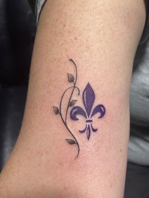 Single Line Violet Tattoo, Fleur De Lis Tattoo Ideas For Women, Flier De Lis Tattoo, Fluer De Lis Tattoo, Dainty Fleur De Lis Tattoo, New Orleans Tattoo, Fluer De Lis Tattoo With Flowers, Inner Wrist Tattoos, Olive Tattoo