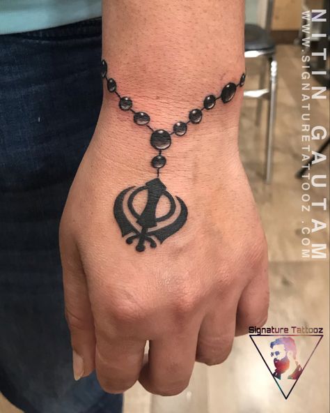 Singh Tattoo Design, Khanda Tattoo Design, Tattoos For Guys Wrist, Khanda Tattoo, Small Tattoos For Boys, Sikh Tattoo, Tattoo Designs On Hand, Arm Tattoo Designs, Wrist Band Tattoo