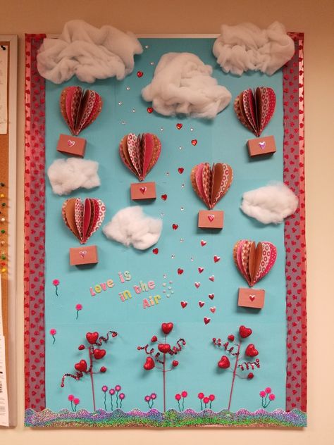 Valentine’s Day Bulletin Board Elementary School, Valentines Classroom Bulletin Boards, Valentine Bulletin Board Ideas For Work, Love Is In The Air Bulletin Board, Valentines Classroom Decor, Valentines Day Bulletin Board Preschool, February Door Ideas For Classroom, Valentines Boards Bulletin, February Door Decorations Classroom