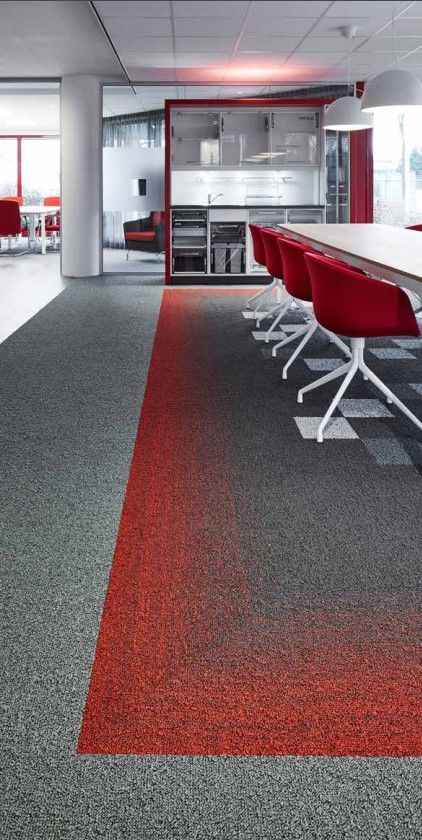 We like this red interior design at Häfele, Netherlands. Fuse is a striking carpet tile that adds movement to the floor by effortlessly flowing between two contrasting yet complimentary colour schemes to help zone and divide large interior spaces such as open plan offices. Office Flooring Ideas Carpet, Commercial Office Flooring, Unique Carpet Design, Red Carpet Interior Design, Office Carpet Tiles Design, Carpet Office Design, Red Office Interior, Office Carpet Ideas, Red Office Design