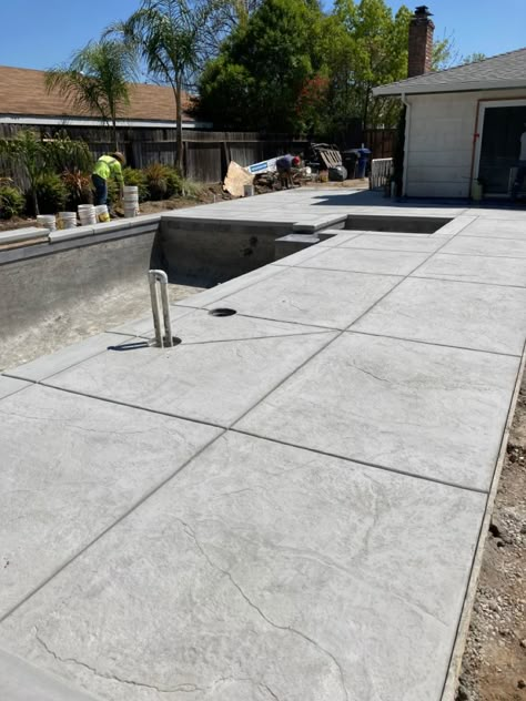 Sand Finish Concrete Pool Deck, Inground Pool Concrete Surround, Cement Pool Deck Ideas, Polished Concrete Around Pool, Concrete Patio Around Pool, Pool Concrete Ideas, Concrete Around Pool Ideas, Brushed Concrete Pool Deck, Stamped Concrete Around Pool