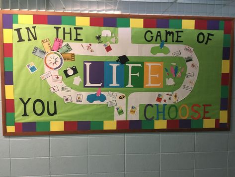 Game Of Life Bulletin Board Ideas, Game Of Life Hallway Decorations, Life Board Game Decorations, Game Of Life Classroom Theme, The Game Of Life Decorations, Game Theme Door Decorations, Board Game School Theme, Game Of Life Bulletin Board, Game Of Life Decorations