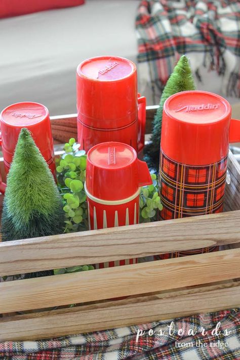 Vintage Thermos Christmas Vignette Vintage Thermos Decor, Wooden Crates Christmas, Christmas Vignette, 1960s Christmas, Camping Christmas, Christmas Decor Vintage, Vintage Thermos, Christmas Vignettes, Country Sampler