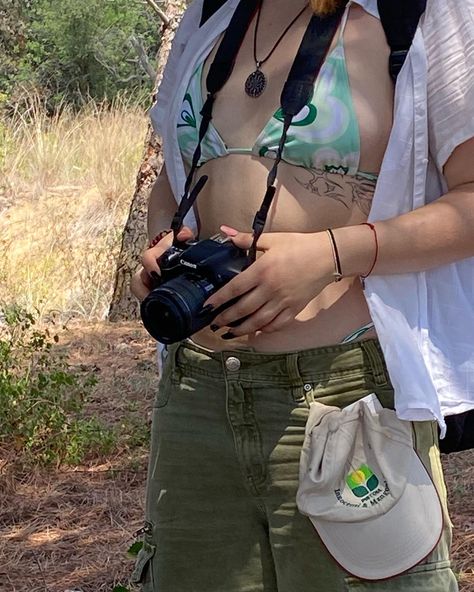 a zoomed in picture of details a green bikini with a white button down and green jorts holding a camera Khaki Jorts Outfit, Green Jorts Outfit Idea, Jorts Outfit Idea, Outfit Ideas Vacation, Jorts Outfit, Summer Outfit Ideas, Green Outfit, Summer Outfit, Army Green